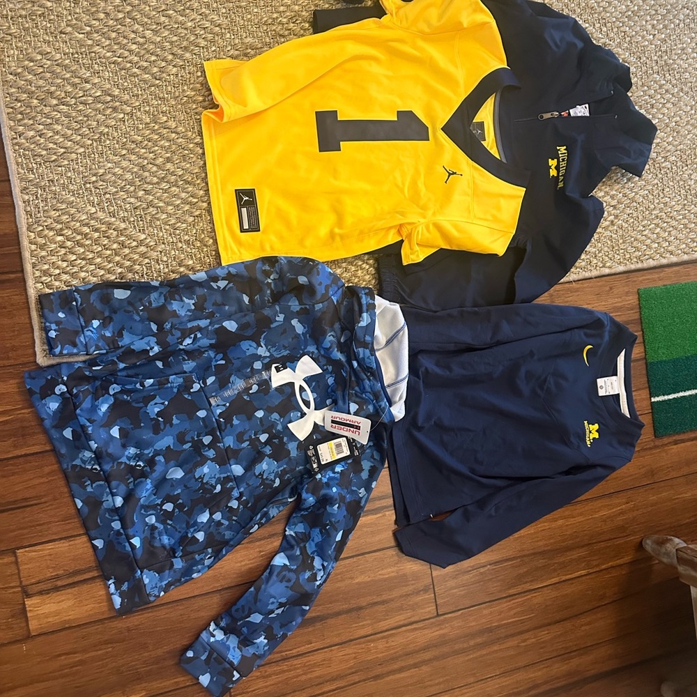 Michigan and Under Armour. Youth Small and Medium, 7/8